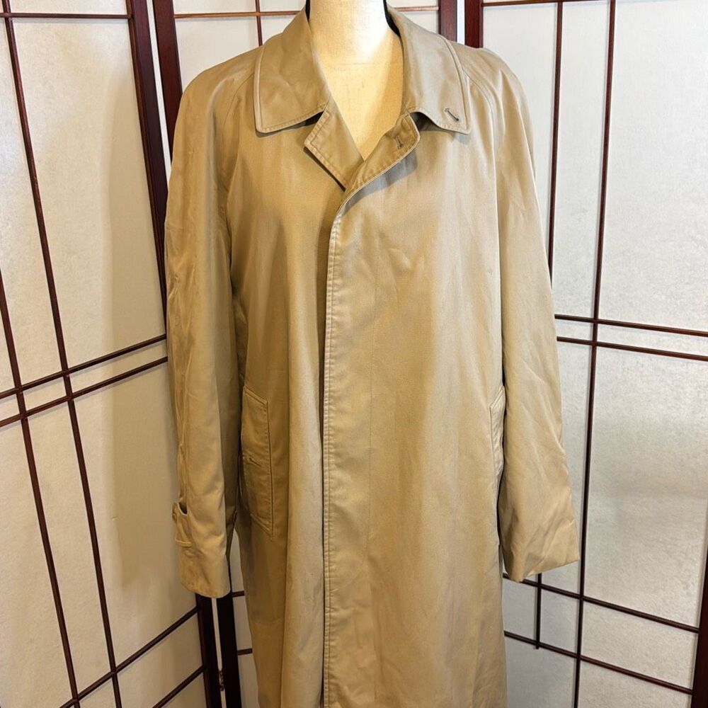 Burberrys’ long suit  trench coat with attached lining